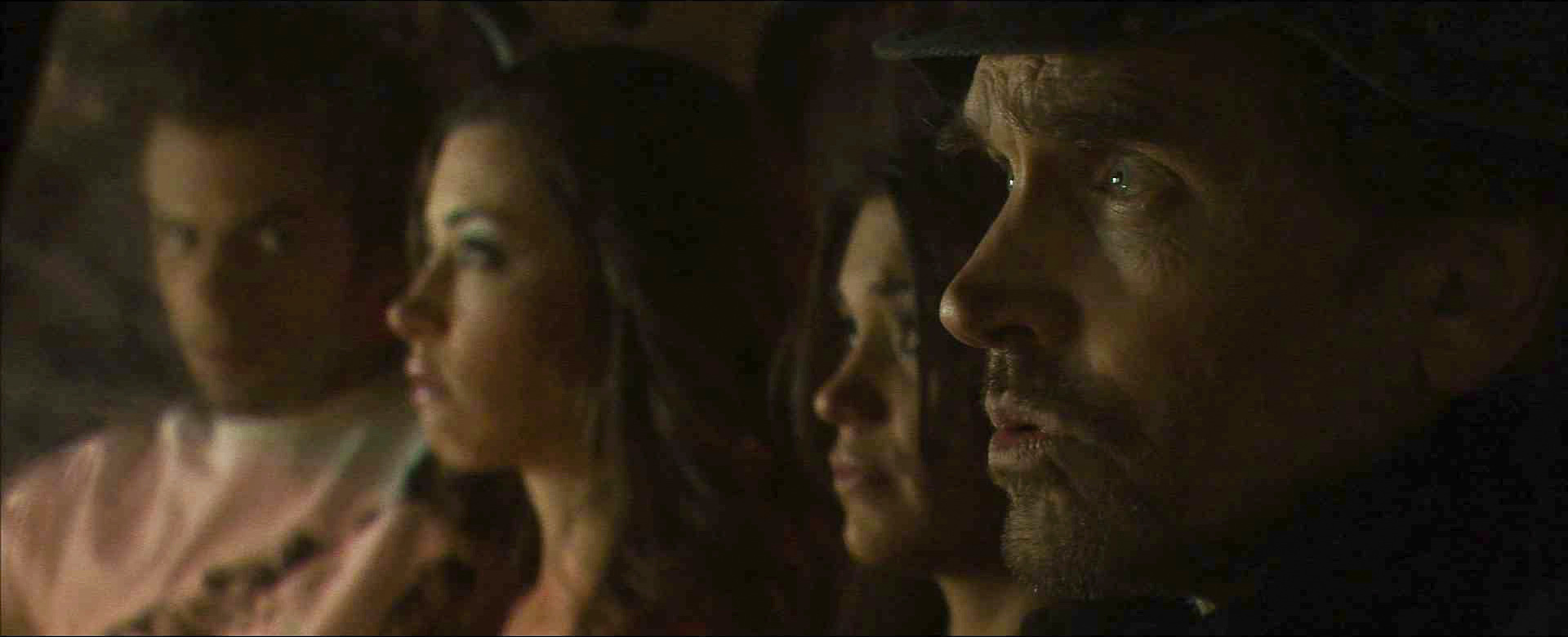 Alex, Nicole, Lanie and Gus sit together in the van